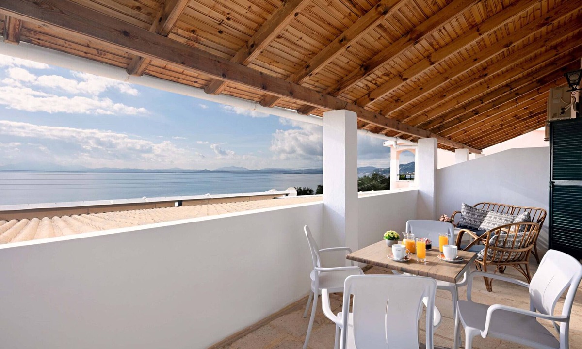 Barbati Apartment | Apartment with sea views in complex with pool and restaurant.