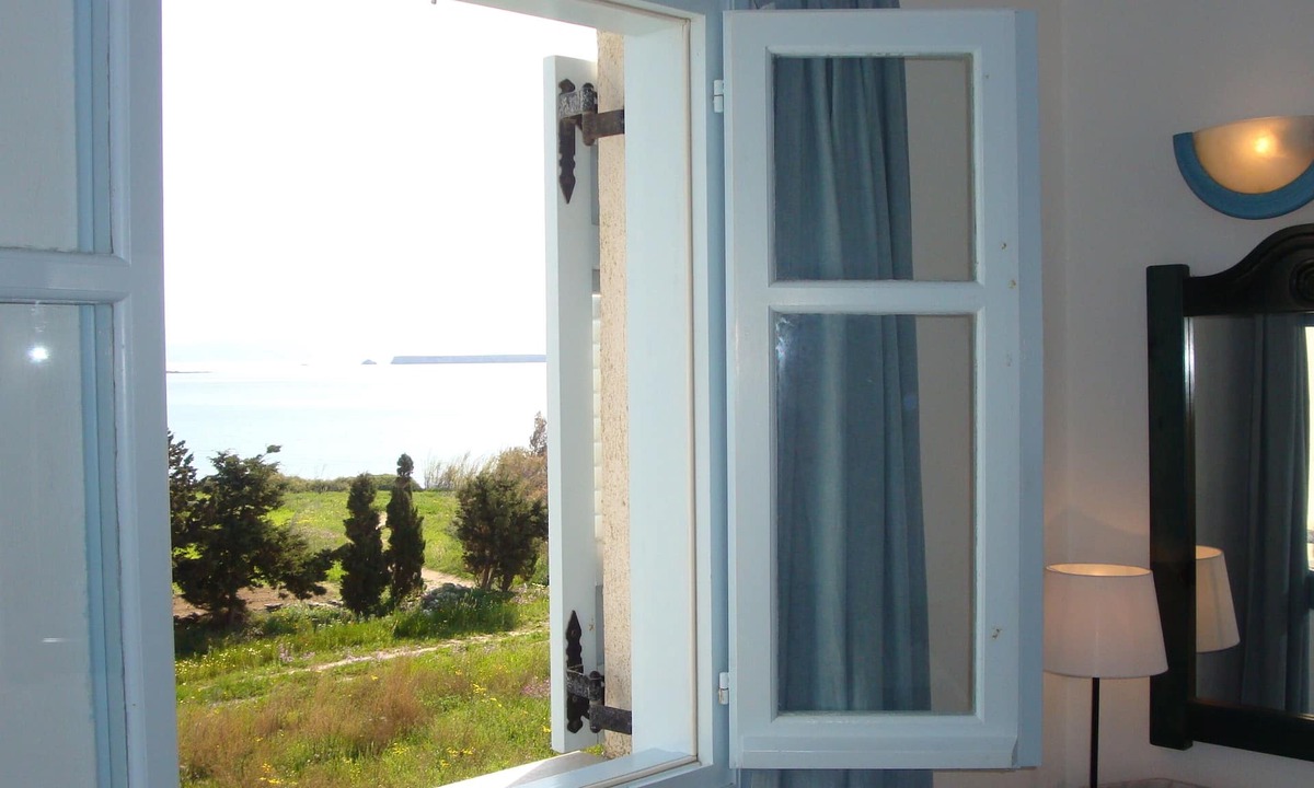 Drios Apartment | Blue and Sea room with window side sea view
