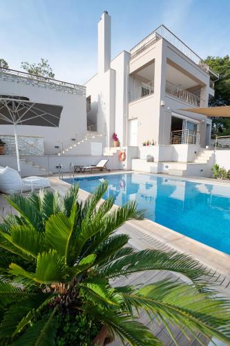 Poros Villa | Kalavria Luxury Suites, Afroditi Suite with magnificent sea view and private swimming pool.
