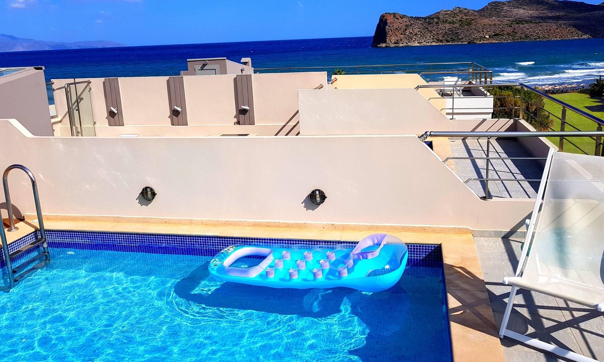 Agia Marina Villa | Luxurious 5-bedroom beachfront villa with a private rooftop pool and sea view