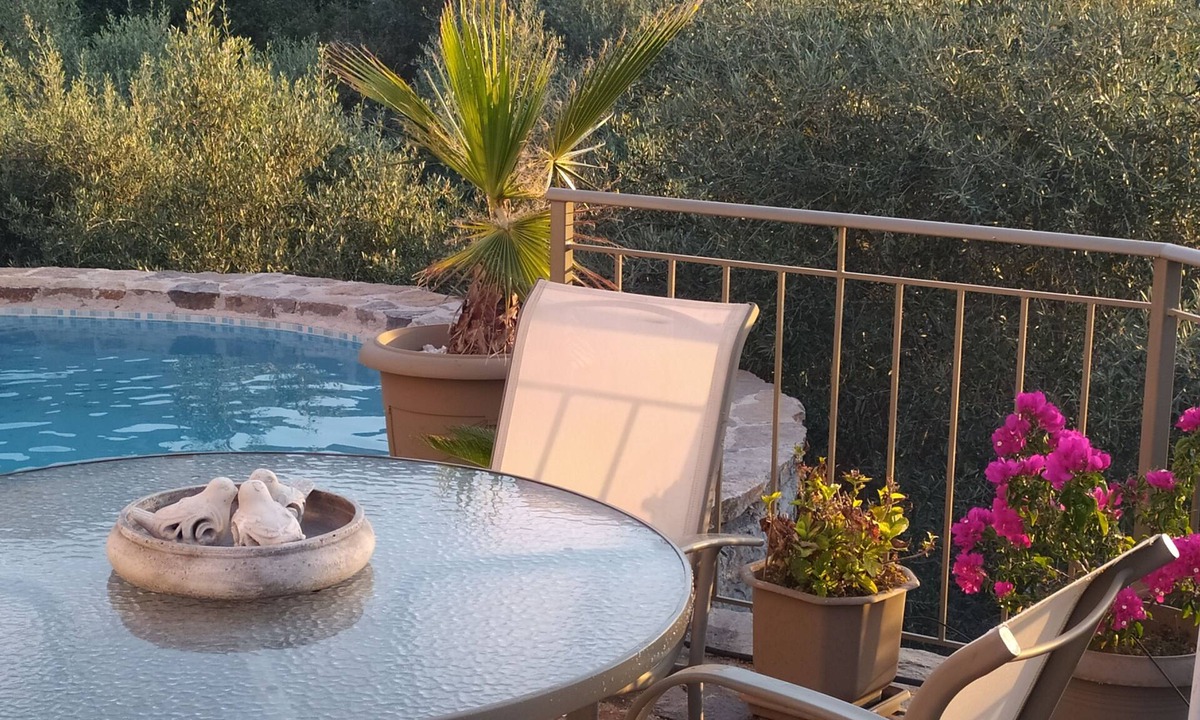 Melidoni Villa | LUXURY VILLA KASTANIA WITH PRIVATE POOL SURROUNDED BY TREES, FLOWERS AND HERBS.