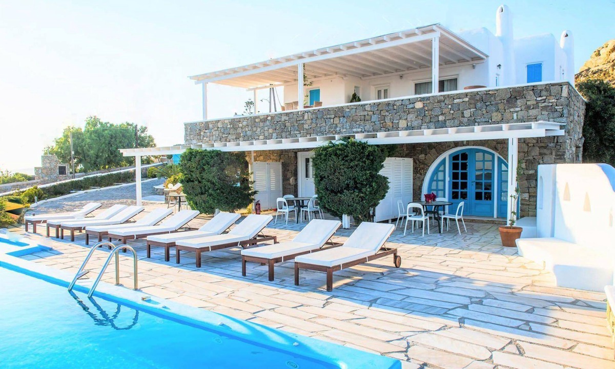 Agios Stefanos House | My Rental Homes - The Rose Flat shared pool air conditioning