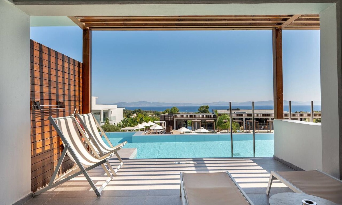 Psalidi Apartment | Superior Double Room with Swim-up Sharing Pool - Sea View