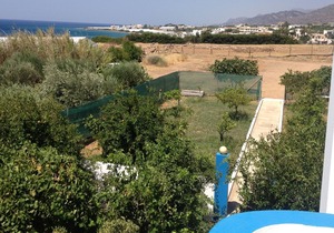 Apartment for 4 with garden and partial sea view.