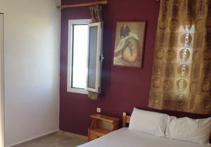 Apartment for 4 with garden and partial sea view.