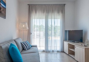 Attractive Holiday Home in Gennadi with Shared Swimming Pool