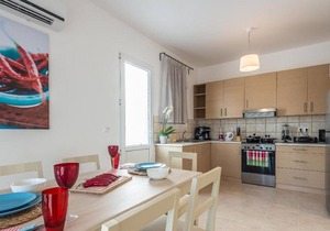 Attractive Holiday Home in Gennadi with Shared Swimming Pool