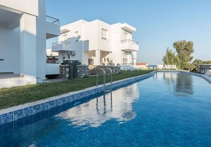 Attractive Holiday Home in Gennadi with Shared Swimming Pool