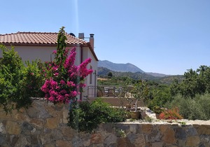 LUXURY VILLA KASTANIA WITH PRIVATE POOL SURROUNDED BY TREES, FLOWERS AND HERBS.