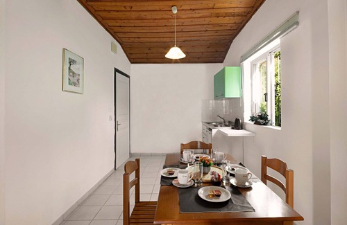 Barbati Apartment | Apartment with sea views in complex with pool and restaurant.