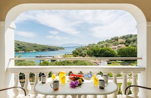 Agios Stefanos Apartment | Evanna: Walk to Beach, Sea Views, A/C, WiFi, Car Not Required