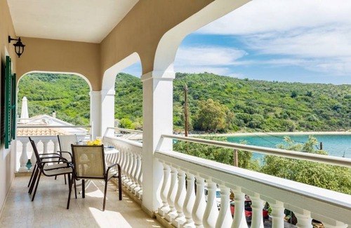 Agios Stefanos Apartment | Evanna: Walk to Beach, Sea Views, A/C, WiFi, Car Not Required