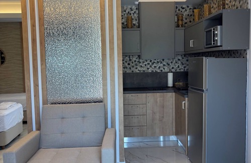 Haraki Apartment | Harriet Beauty Studios