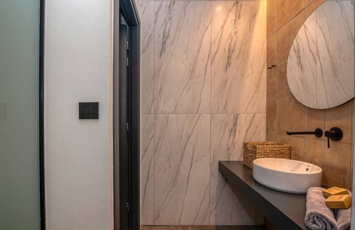 Trachilos House | Nusa retreat - 6-bedroom sea-view residence with private pool and garden