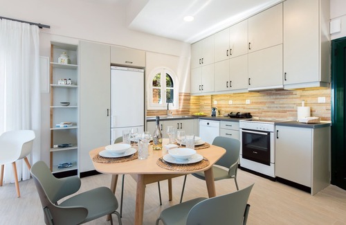 Benitses Villa | Traditional details while in harmony with modern and minimal decoration