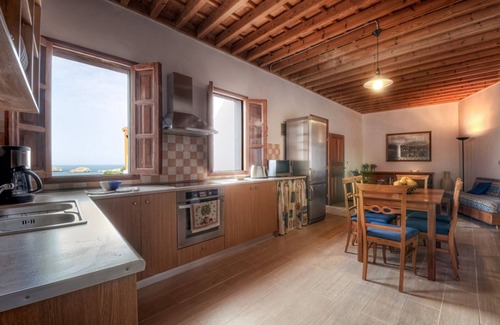 Lindos Villa | Villa Thalassa 1 | 2 Bedrooms with En-suite | Traditional Lindian Bed |.