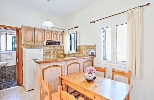 Agni Apartment | Zoulis Eleni: A traditional village apartment in Kalami, just a few steps away from the beach