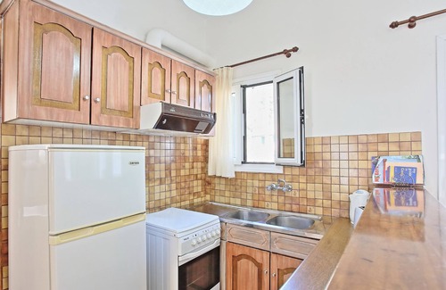 Agni Apartment | Zoulis Eleni: A traditional village apartment in Kalami, just a few steps away from the beach