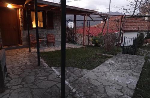 Terpsithea House | Τείχιο Μπουτίκ - Tihio Boutique - Πέτρινος ξενώνας