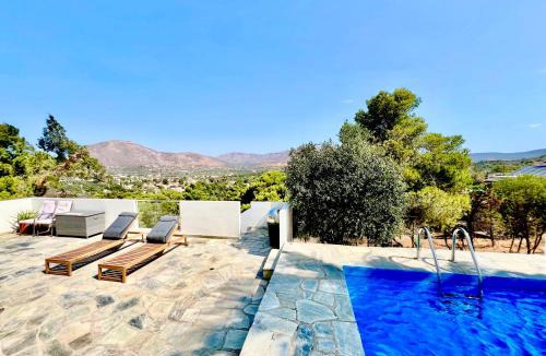 Palaia Fokaia Apartment | 2 bedroom self-contained apartment and swimming pool at Palm Tree Villa