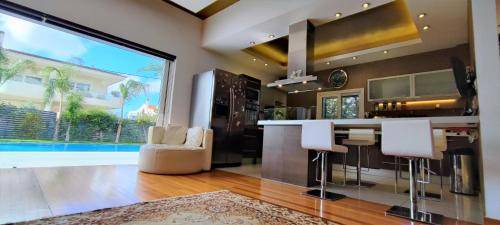 Kalyvia Thorikou Villa | 270 m² Villa ∙ 3 bedrooms ∙ 5 guests