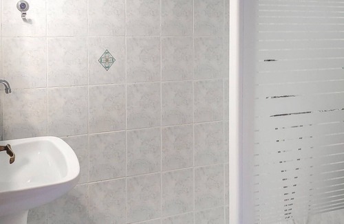 Longos Apartment | A charming apartment perched on the hillside above Loggos offering both easy access to the village a