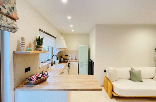 Platanias Town Apartment | A peaceful riverside oasis surrounded by orange and avocado fields
