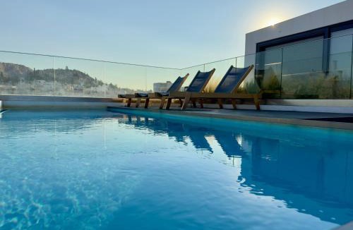 Athens Apartment | Anemoi Home - Luxe Stay with Pool & Gym by TT