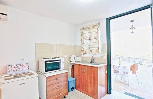 Agni Apartment | Angelina: Charming studio, terrace views, steps from Kalami beach