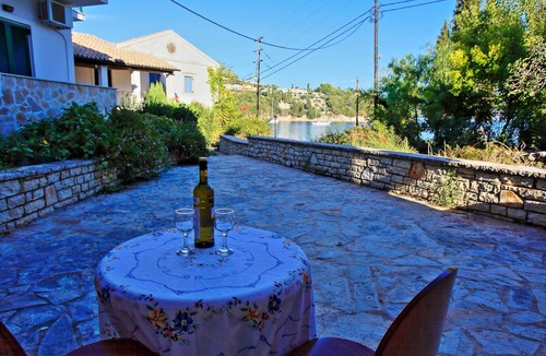 Agni Apartment | Angelina: Charming studio, terrace views, steps from Kalami beach