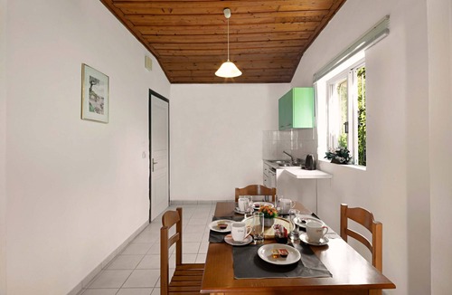 Barbati Apartment | Apartment with sea views in complex with pool and restaurant.