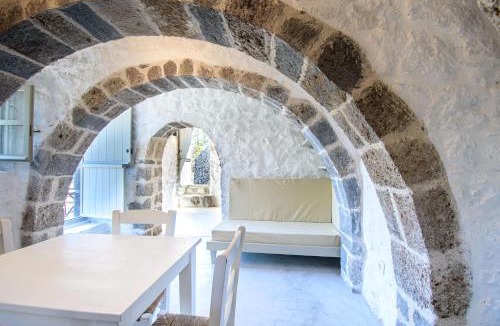 Nisyros Apartment | Apostrophe Traditional Residence in Nisyros with arcurated interior. Privacy & Authenticity