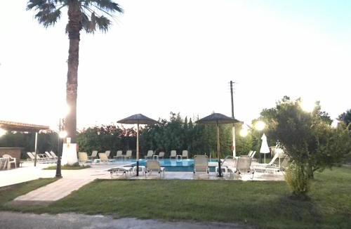 Roda Apartment | Banos Apartments and swimming pool