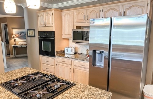 Holiday Isle Villa | BEACH BOATING PARADISE-Heated Pool,2 King Suites,90ft Dock,Game Room,Bikes,5Star