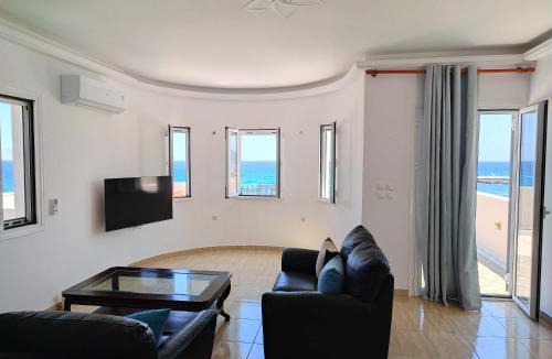 Agia Pelagia Apartment | Beachfront Ela Luxury Stay with Jacuzzi & Views