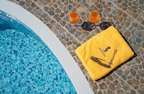 Goudhouros Villa | Beachfront Villa Atalandia with Heated Pool, Gym, BBQ & Office