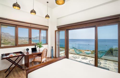 Goudhouros Villa | Beachfront Villa Atalandia with Heated Pool, Gym, BBQ & Office