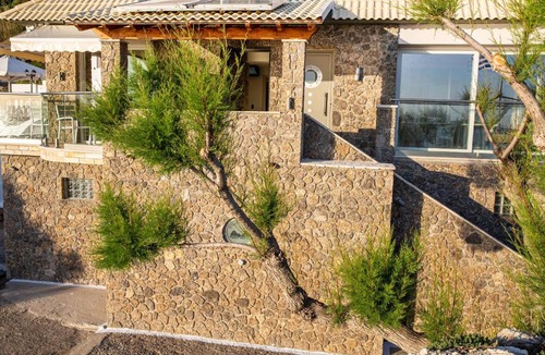 Agios Gordios House | Black Rocks Luxury Seafront Beach Suite