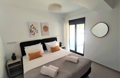 Rethymno Apartment | Brand new condo next to the beach, peaceful square, garden view