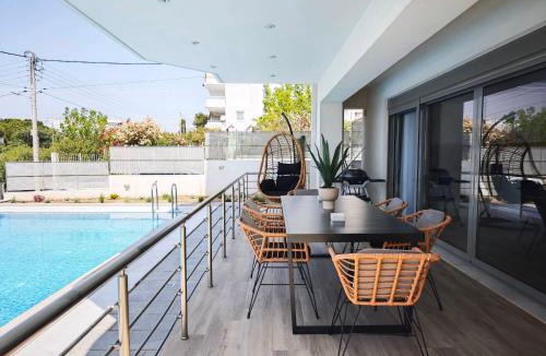 Voula Apartment | Costa Voula Poolside and Beach, Home Cinema