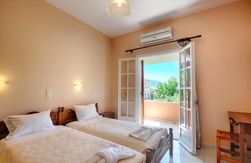 Agios Georgios Pagon Apartment | Dora Apartment 4 - in a quiet location only 300m from the sandy beach - in the bay of Agios Geo