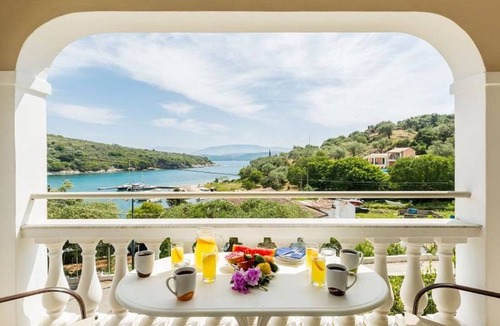 Agios Stefanos Apartment | Evanna: Walk to Beach, Sea Views, A/C, WiFi, Car Not Required