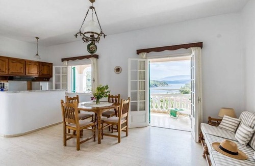 Agios Stefanos Apartment | Evanna: Walk to Beach, Sea Views, A/C, WiFi, Car Not Required