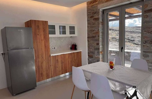 Pisses Apartment | Experience Authentic Charm at Tzia Stone Apt with a Modern Twist and Sea Views