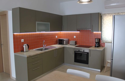Agios Nikolaos Apartment | Footsteps to the beach!
