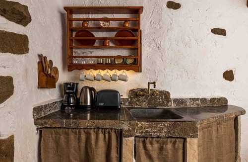 Aspros Potamos Cottage | "Harmony" 300 years old cottage "Natura cottages"