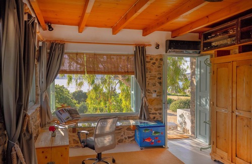 Gourna Cottage | House facing the sea with 5,000 m² garden, swimming pool and unforgettable sunsets.