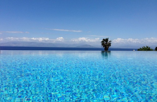 Notos Villa | Ionian Pearl villa in Corfu. Private pool - Jacuzzi - Sauna - Cinema, 4 bedrooms