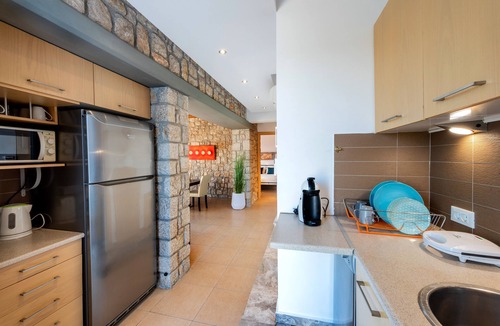 Pefkos Villa | Luxury Newly Built Stone Villa with Private Pool-Jacuzzi, Ideal for Relaxation.