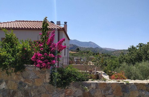 Melidoni Villa | LUXURY VILLA KASTANIA WITH PRIVATE POOL SURROUNDED BY TREES, FLOWERS AND HERBS.